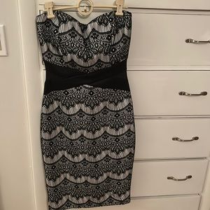 strapless with lace sheer illusion corset-design waist mini-length hem.